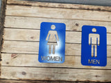 Men and woman metal bathroom door sign