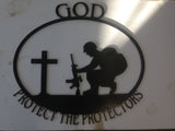Soldier Kneeling at Cross