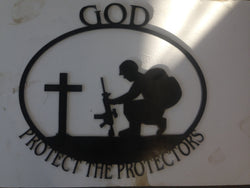 Soldier Kneeling at Cross